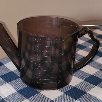 Lot 225: Kitchen Assorted Measuring Cups, Juicer & Funnels