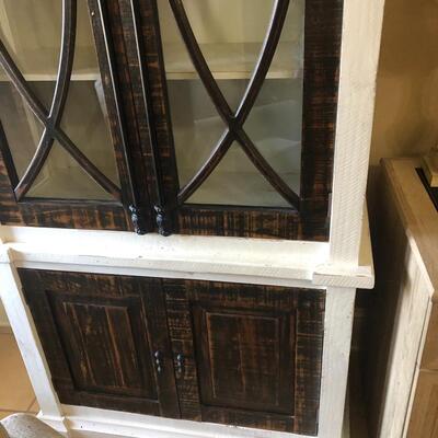 Two glass door bookshelves or cabinets 