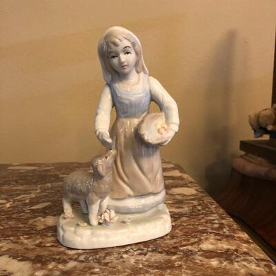 Porcelain girl with lamb