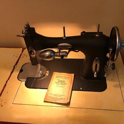 Vintage White sewing machine and cabinet