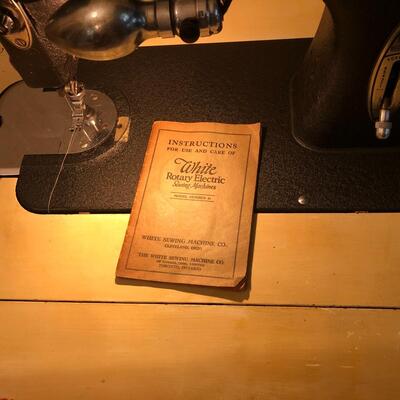 Vintage White sewing machine and cabinet