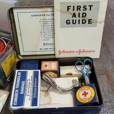 Lot 254: Vintage First Aid and Traffic Safety Reflector Kits