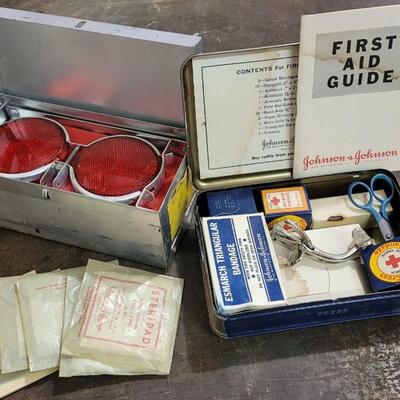 Lot 254: Vintage First Aid and Traffic Safety Reflector Kits