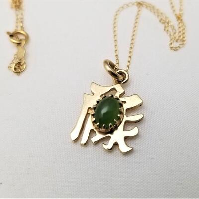 Lot #158  14kt Gold Pendant and Earring Set with Jade accents