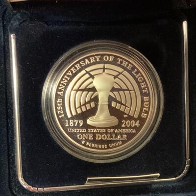 90% SILVER DOLLAR COIN. FEATURING THOMAS ALVA EDISON