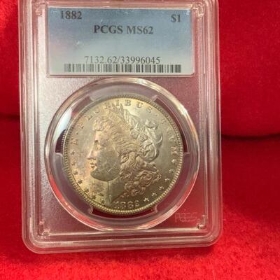 1882 PCGS GRADED MS62 BY PCGS MORGAN DOLLAR BEGINNING TO TONE