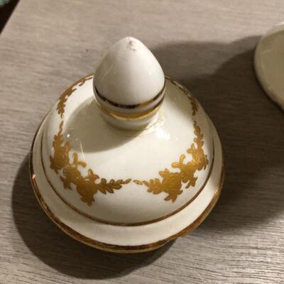 Two Italian baluster shape vases with lids