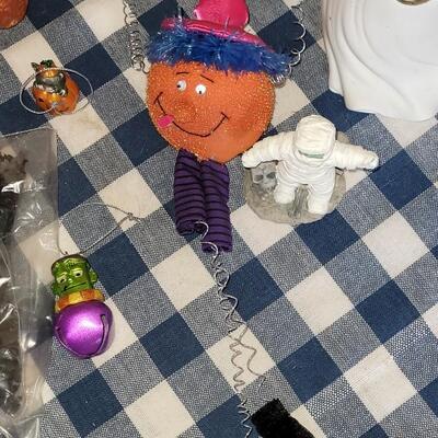 Lot 285: Halloween Decorations Lot (Confetti. Lights, Ornaments, Candleholder ect.)