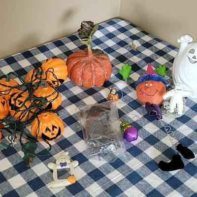 Lot 285: Halloween Decorations Lot (Confetti. Lights, Ornaments, Candleholder ect.)
