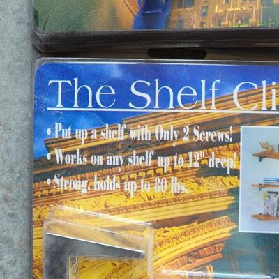 Lot 293: (2) New in Package Shelf Clips (A)