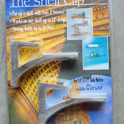 Lot 295: (2) New in Package Shelf Clips (C)