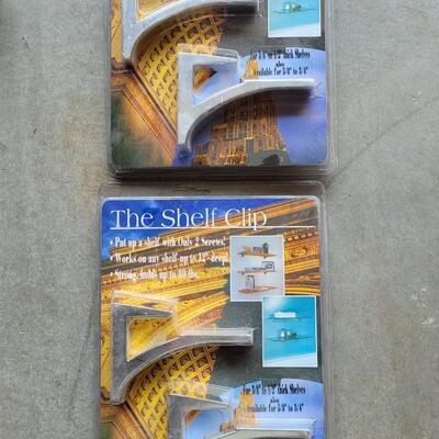 Lot 295: (2) New in Package Shelf Clips (C)