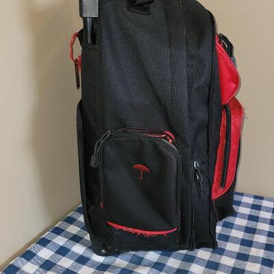 Lot 332: Primerica Rolling Red Backpack