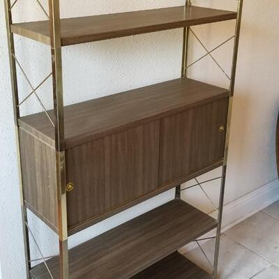 Lot #223  Mid Century Modern Metal Bookcase - Sliding Doors