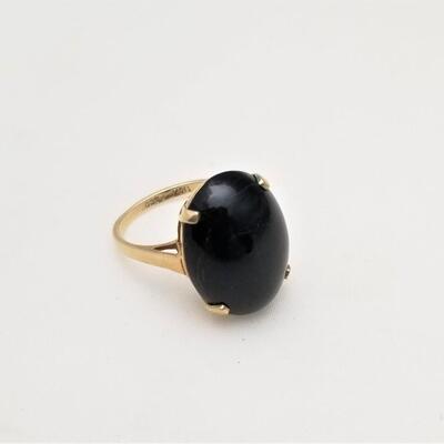 Lot #247   10kt gold ring with black Cabochon stone