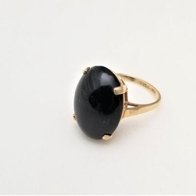 Lot #247   10kt gold ring with black Cabochon stone