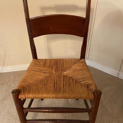 Vintage wooden chair with rush seat