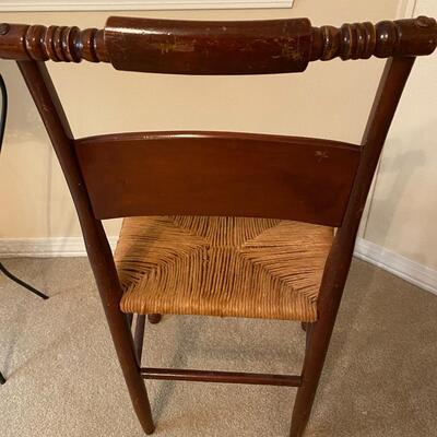 Vintage wooden chair with rush seat