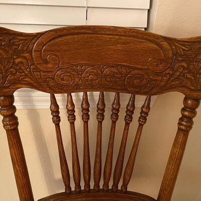 Antique oak pressed back chair with cane seat
