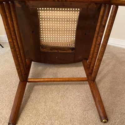 Antique oak pressed back chair with cane seat