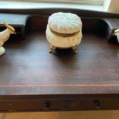 Antique black wooden writing desk with stenciling and cubbies