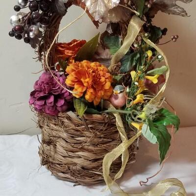 Lot 70: Silk Flowers with a Bird in a Basket