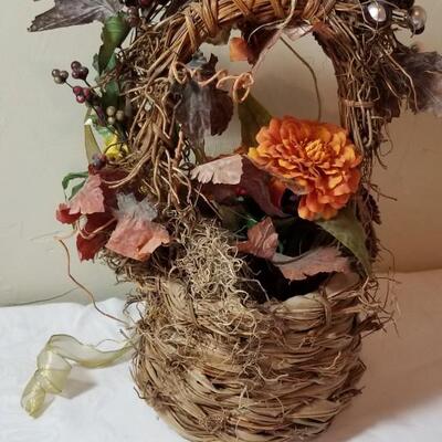 Lot 70: Silk Flowers with a Bird in a Basket