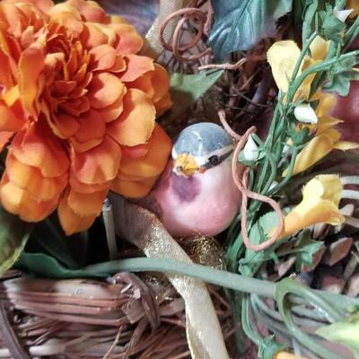 Lot 70: Silk Flowers with a Bird in a Basket