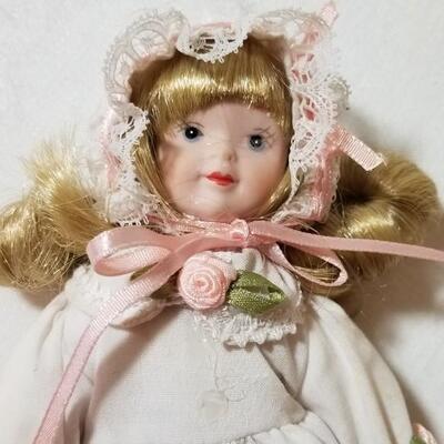 Lot 76: (2) Porcelain Dolls