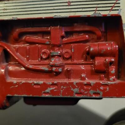 Lot 102: Vintage Cast Iron FARMALL 460 Toy Tractor