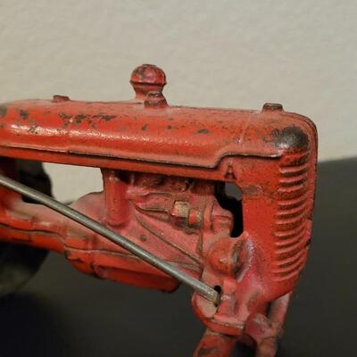 Lot 103: Vintage Diecast Iron Tractor with Nickel Plated Driver