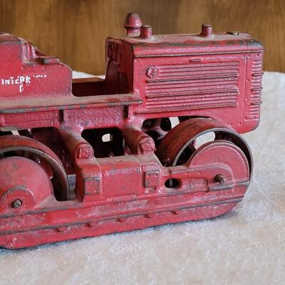 Lot 106: Antique International Diesel Cast Iron Trac Tractor with Nickel Plated Driver