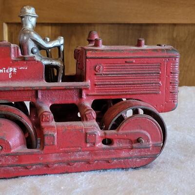 Lot 106: Antique International Diesel Cast Iron Trac Tractor with Nickel Plated Driver