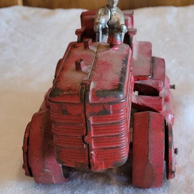 Lot 106: Antique International Diesel Cast Iron Trac Tractor with Nickel Plated Driver