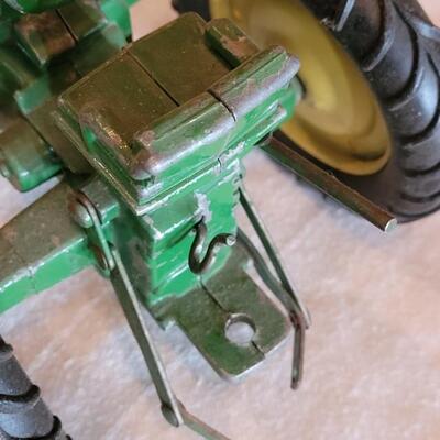 Lot 107: Vintage John Deer Cast Iron Tractor