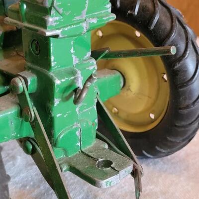 Lot 107: Vintage John Deer Cast Iron Tractor
