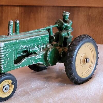 Lot 108: Vintage John Deer Cast Iron Tractor with Green Cast Iron Driver