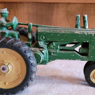 Lot 108: Vintage John Deer Cast Iron Tractor with Green Cast Iron Driver