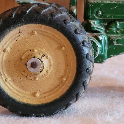 Lot 108: Vintage John Deer Cast Iron Tractor with Green Cast Iron Driver