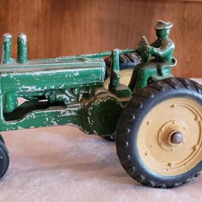Lot 108: Vintage John Deer Cast Iron Tractor with Green Cast Iron Driver