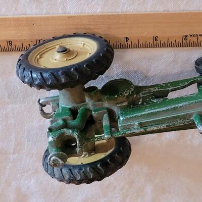 Lot 108: Vintage John Deer Cast Iron Tractor with Green Cast Iron Driver