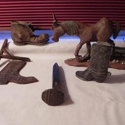 LOT 141  SMALL BOOT FIGURES