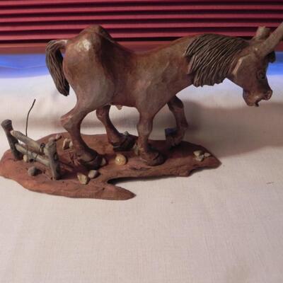 LOT 141  SMALL BOOT FIGURES
