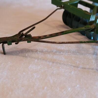 Lot 115: Vintage John Deer Disk Harrow Toy
