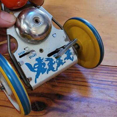 Lot 132: 1930's Kiddy Cyclist Wind Up Tin Toy by Unique Art Mfg. Co. (works)