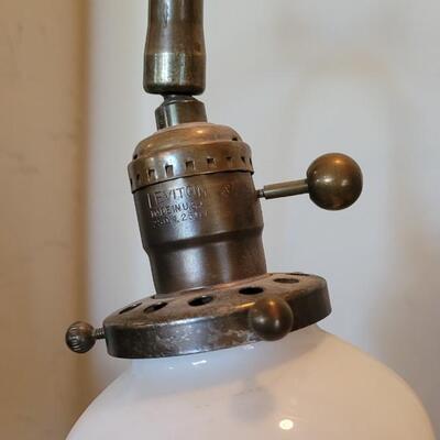 Lot 136: Antique Lamp with Milk Glass Ruffle Rim Shade with Black Ribbon Edge Detail 