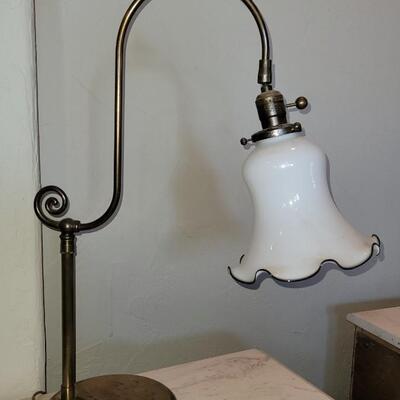 Lot 136: Antique Lamp with Milk Glass Ruffle Rim Shade with Black Ribbon Edge Detail 