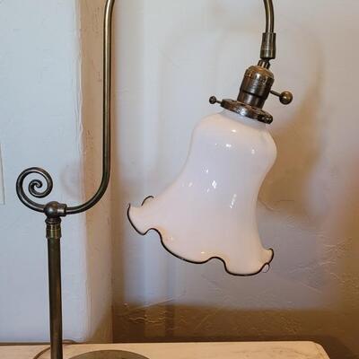 Lot 136: Antique Lamp with Milk Glass Ruffle Rim Shade with Black Ribbon Edge Detail 