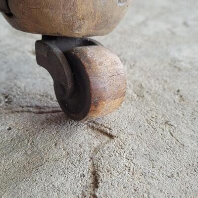 Lot 142: Vintage Claw Foot Dining Table w/ Wood Coaster Wheels includes Multiple Leaves