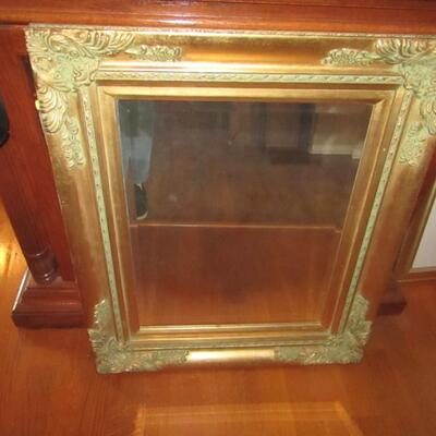 LOT 37  BEVELED WALL MIRROR WITH WOODEN FRAME
